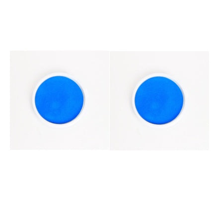 Two blue circular objects on a white background
