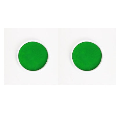 Two green circular objects on a white background