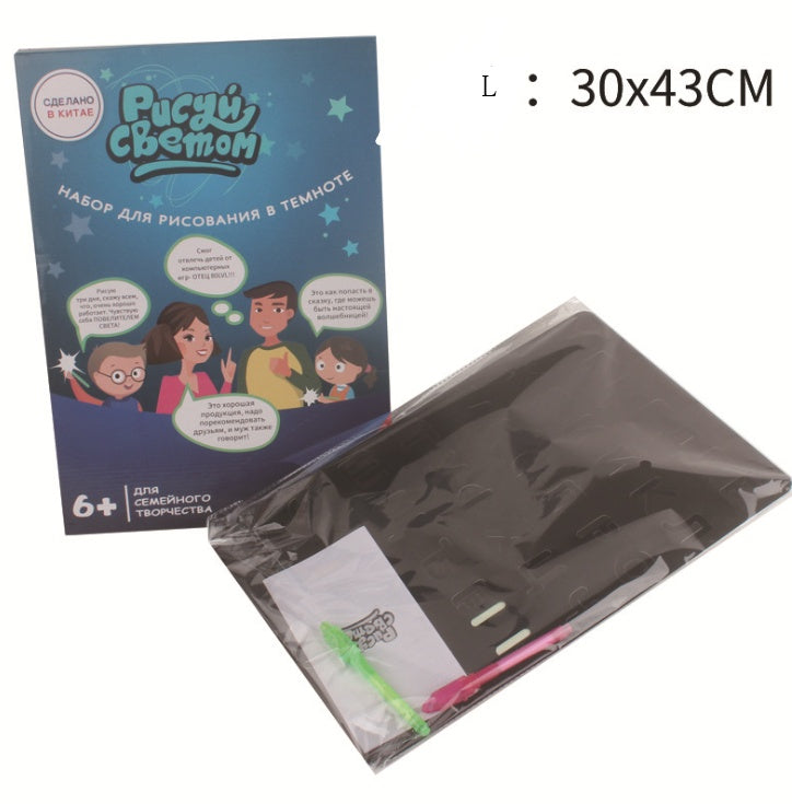 Magic Glow-in-the-Dark Drawing Tablet toy kit with colorful markers and a dark surface for mess-free creative art activities.