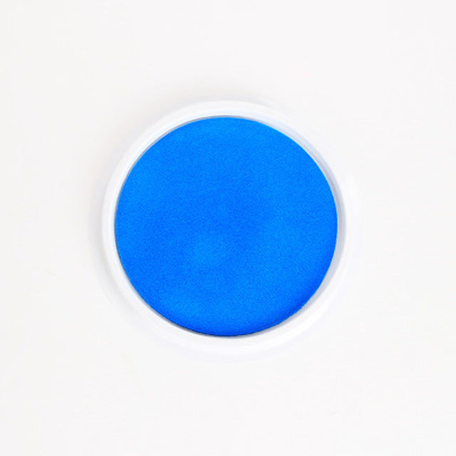 Blue circular object on a white background