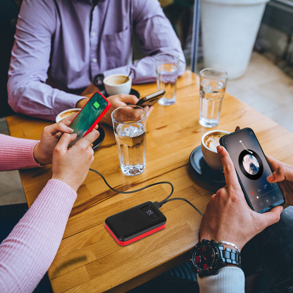 1 portable 10000mAh ultra-compact power bank with digital display and dual charging ports for mobile devices.