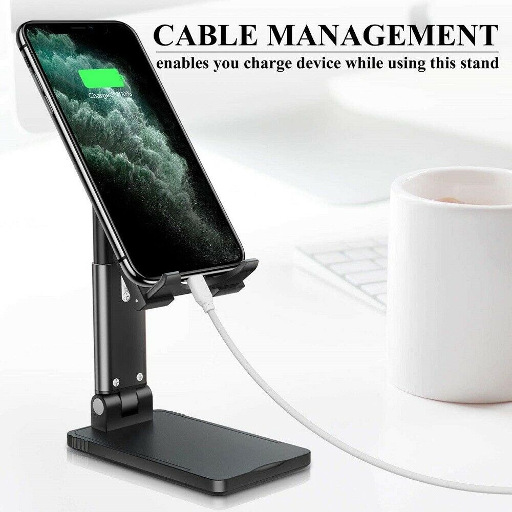 Titanium-grade foldable desktop laptop stand by 1 showing a sleek, adjustable ergonomic device mount on a workspace.