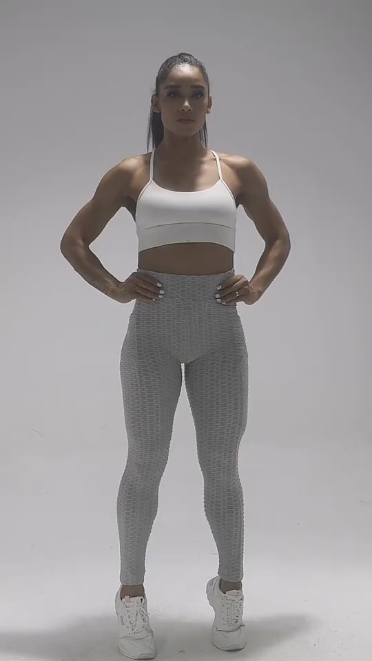 Girl wearing grey leggy